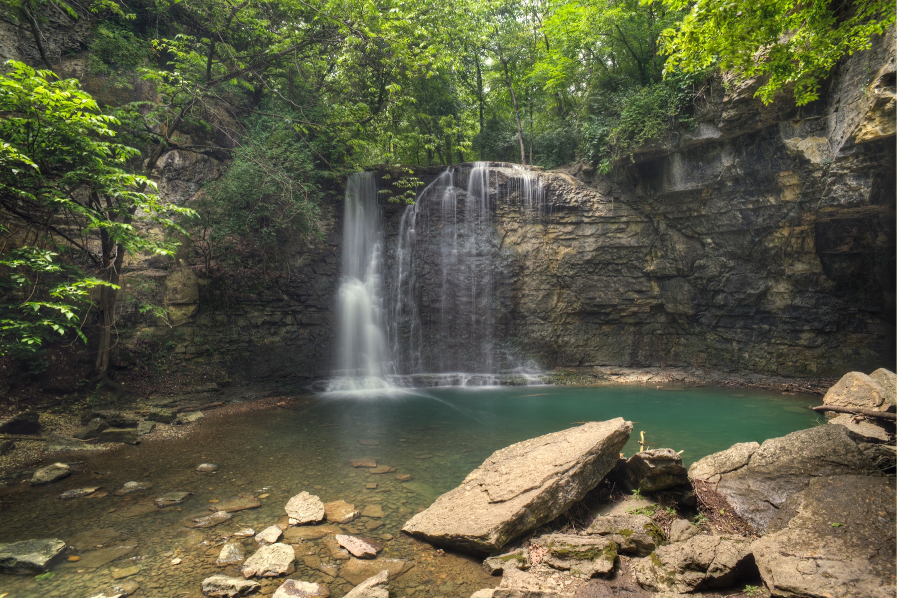 Hayden Falls flowing over a broad rock ledge in Columbus